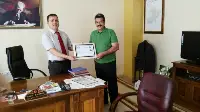 Arif Güler'e Başarı Belgesi
